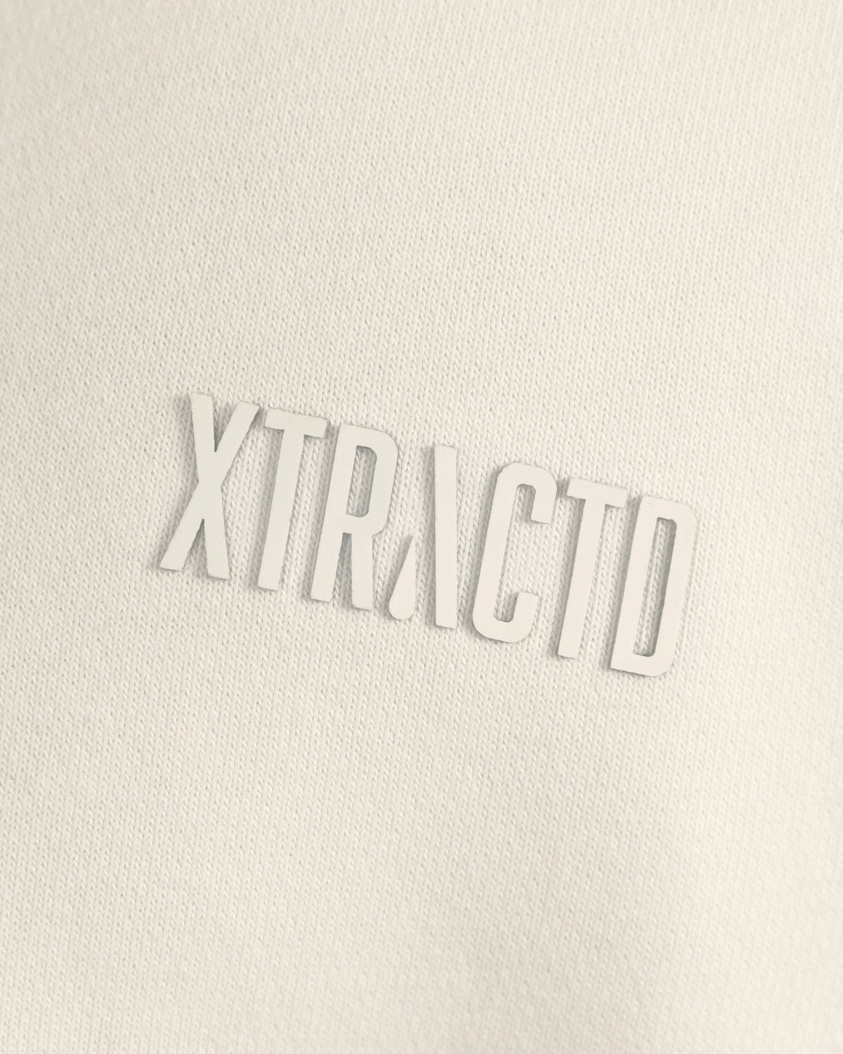 XTRACTD Hoodie 3D – Oat Milk – Nahaufnahme von Stoff und Druck