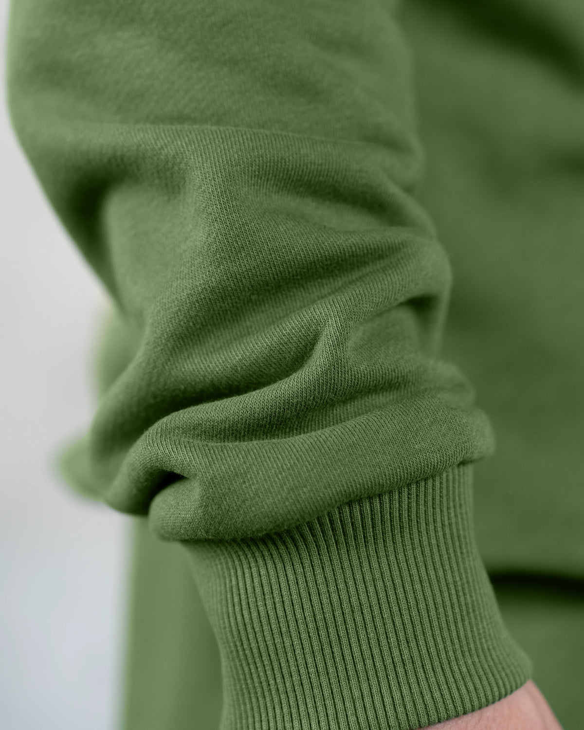 XTRACTD Hoodie Rebellion – Coffee Leaf – Nahaufnahme von Stoff und Druck